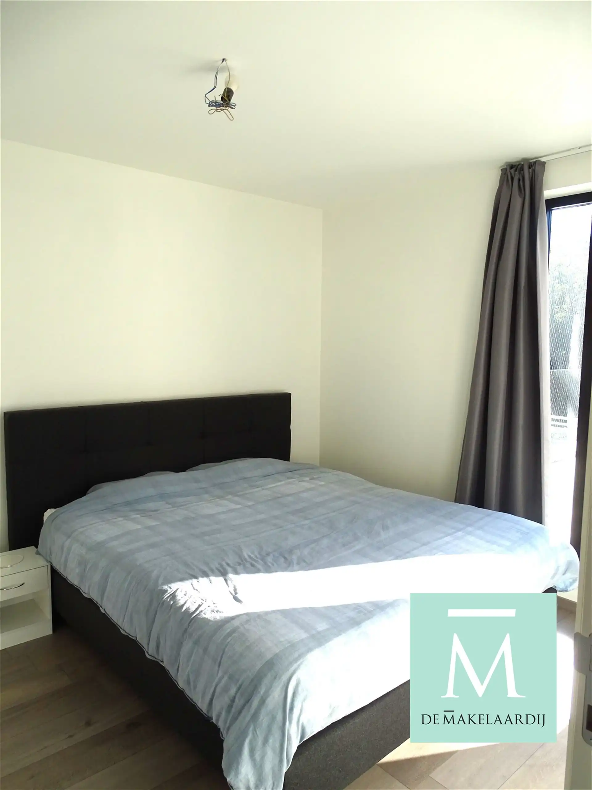 Aangenaam appartement, 2 slaapkamers, ruim terras (75m²), kelder en autostaanplaats foto 6