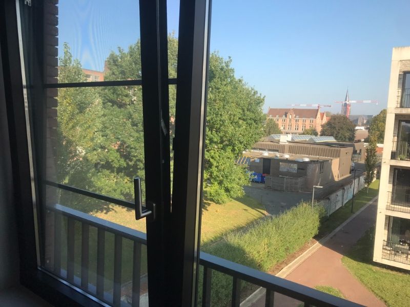 Gezellig zon georiënteerd 2slk appartement met groen uitzicht, met terras, kelder en private garagebox  in afgesloten garagecomplex op wandelafstand van centrum van EEklo foto 15