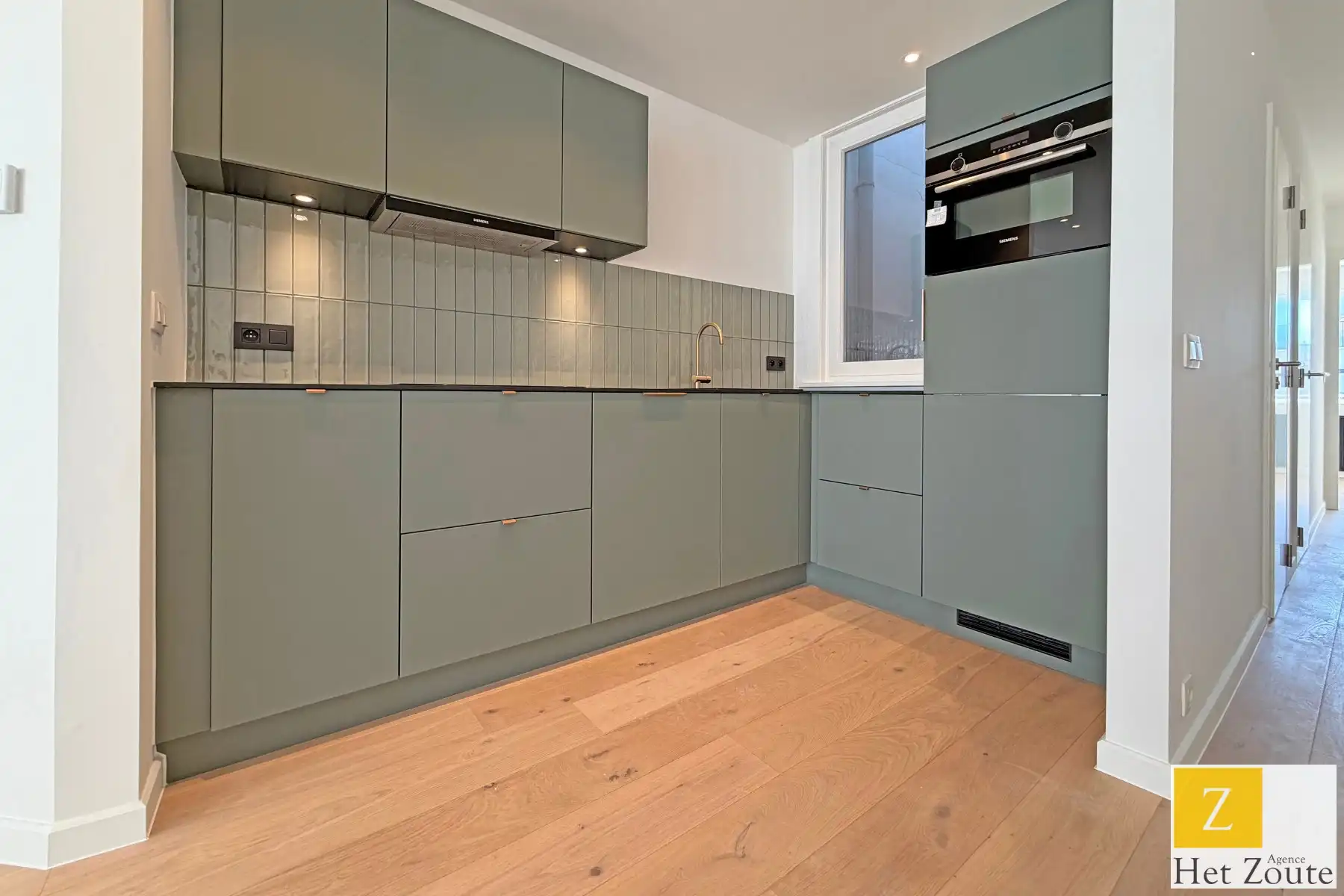 Gezellig instaplaar appartement op enkele passen van Zeedijk foto 3