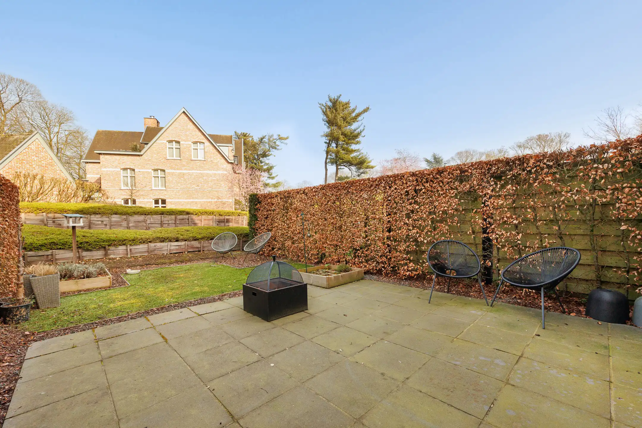 Gelijkvloers appartement met terras/tuintje te huur foto 4