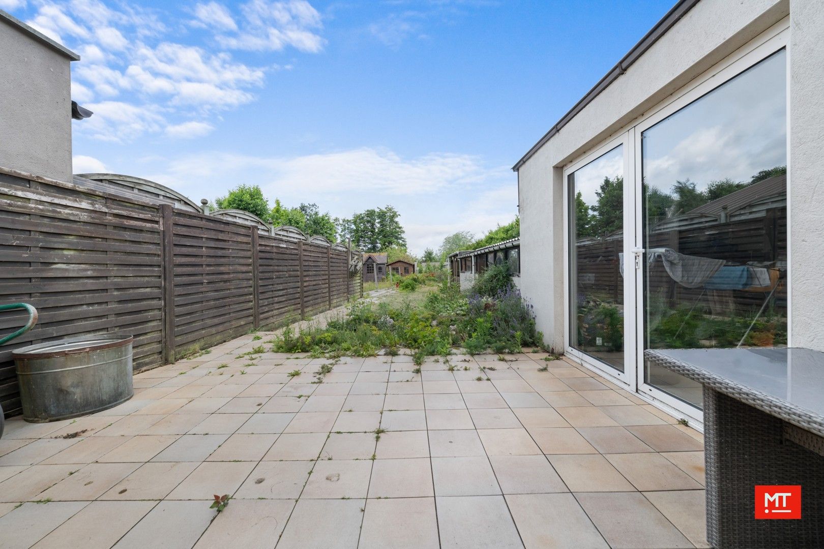 Op te frissen halfopen woning met 4 slaapkamers, tuin en garage foto 16