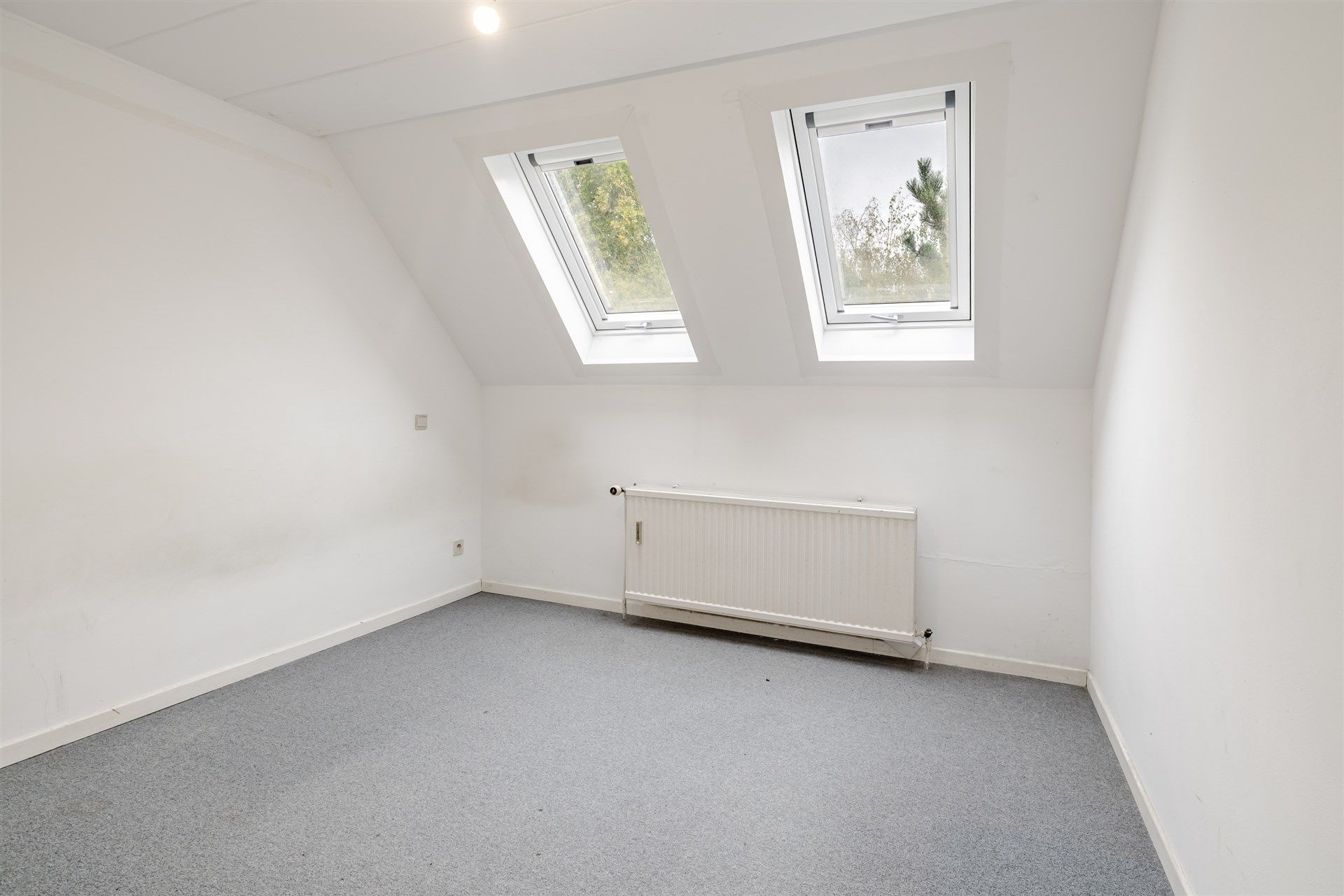 Opbrengsteigendom bestaande uit 4 appartementen + 22 garageboxen + magazijn/werkplaats foto 6