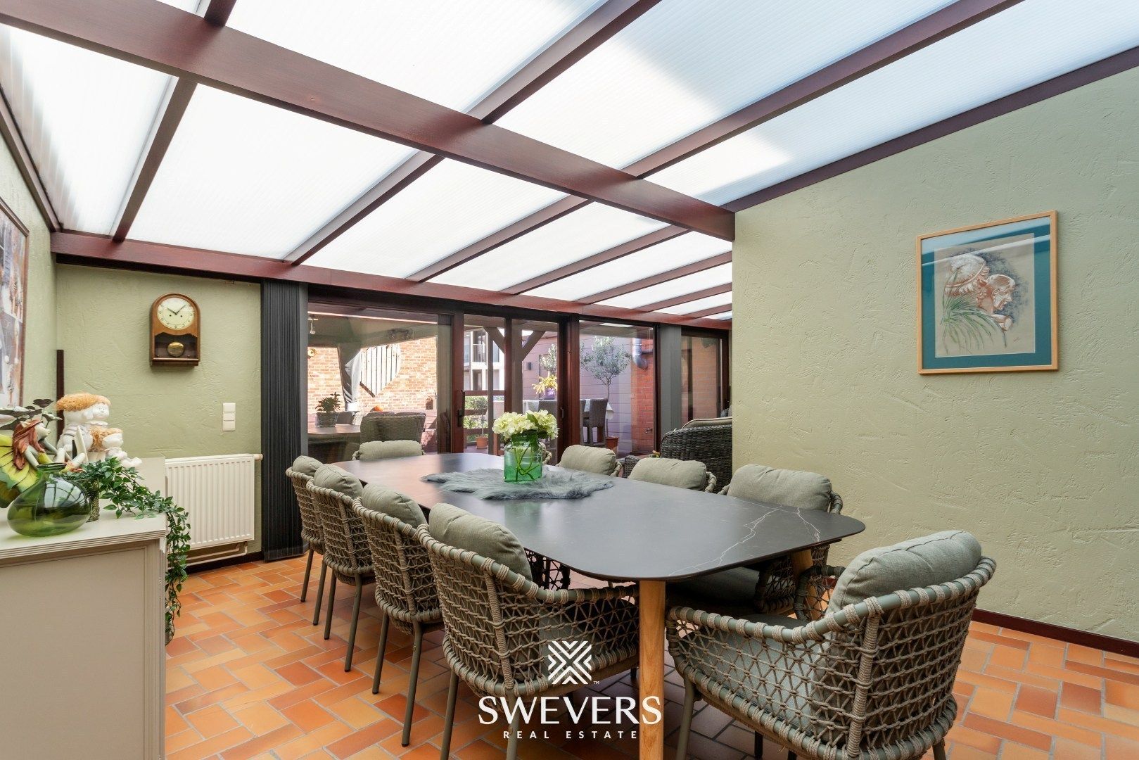 Ruim duplexappartement met grote veranda, riant terras, tuin en garage in hartje Lummen foto 17