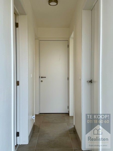 Schakelwoning in hartje Godsheide foto 16
