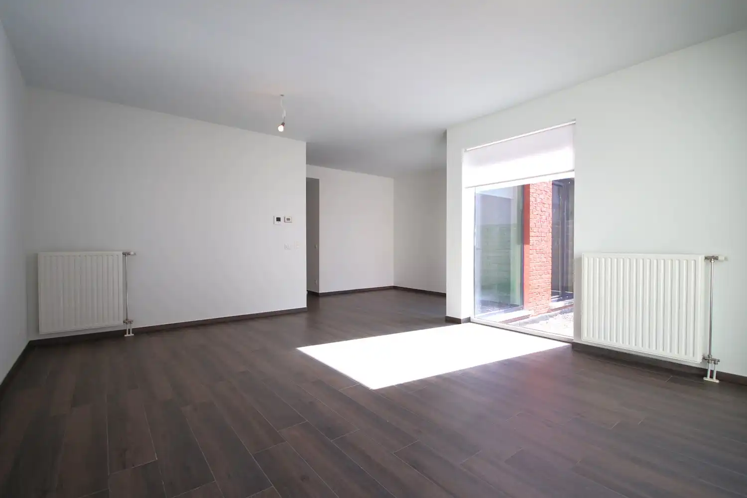 Modern gelijkvloers appartement met 2 slaapkamers en groot terras foto 2