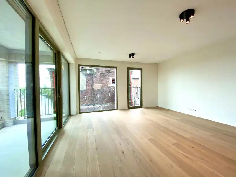 Instapklaar recent appartement met 2 slaapkamers foto 6