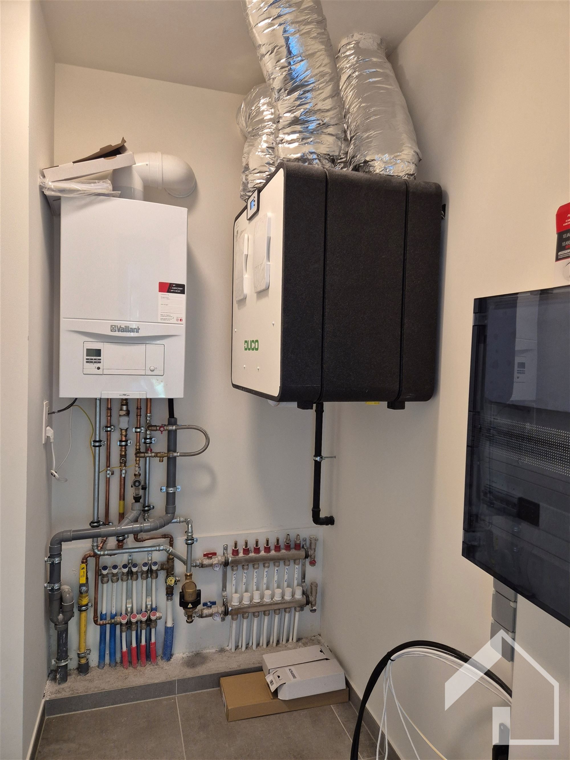 Nieuwbouwappartement op 1e verdieping met lift, 2 slaapkamers, autostaanplaats en kelder foto 9