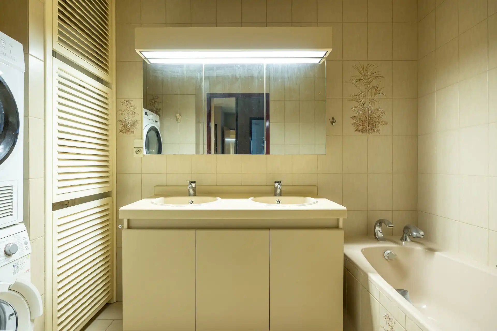 Lichtrijk appartement met drie slaapkamers en terras foto 26