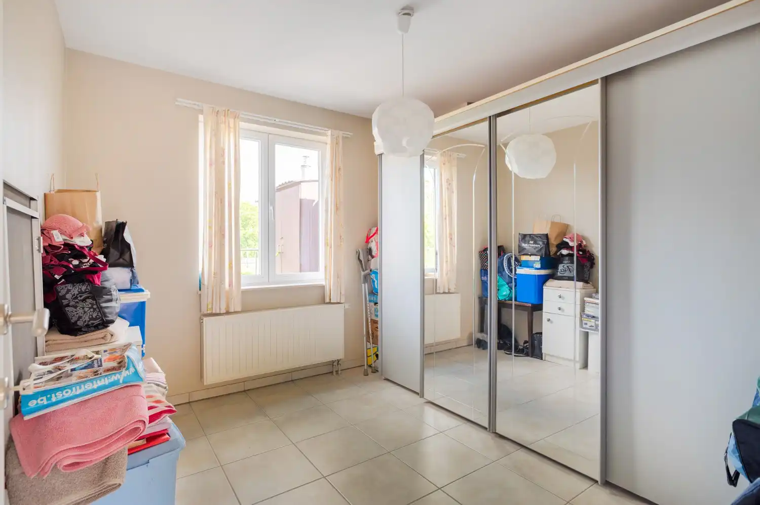 Opbrengsteigendom of co-housing met 2 ruime appartementen in het centrum van Broechem! foto 26