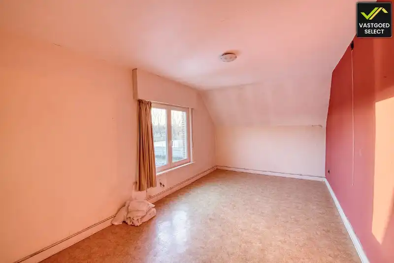 Te renoveren woning met tuin en garage in Sint-Laureins foto 8