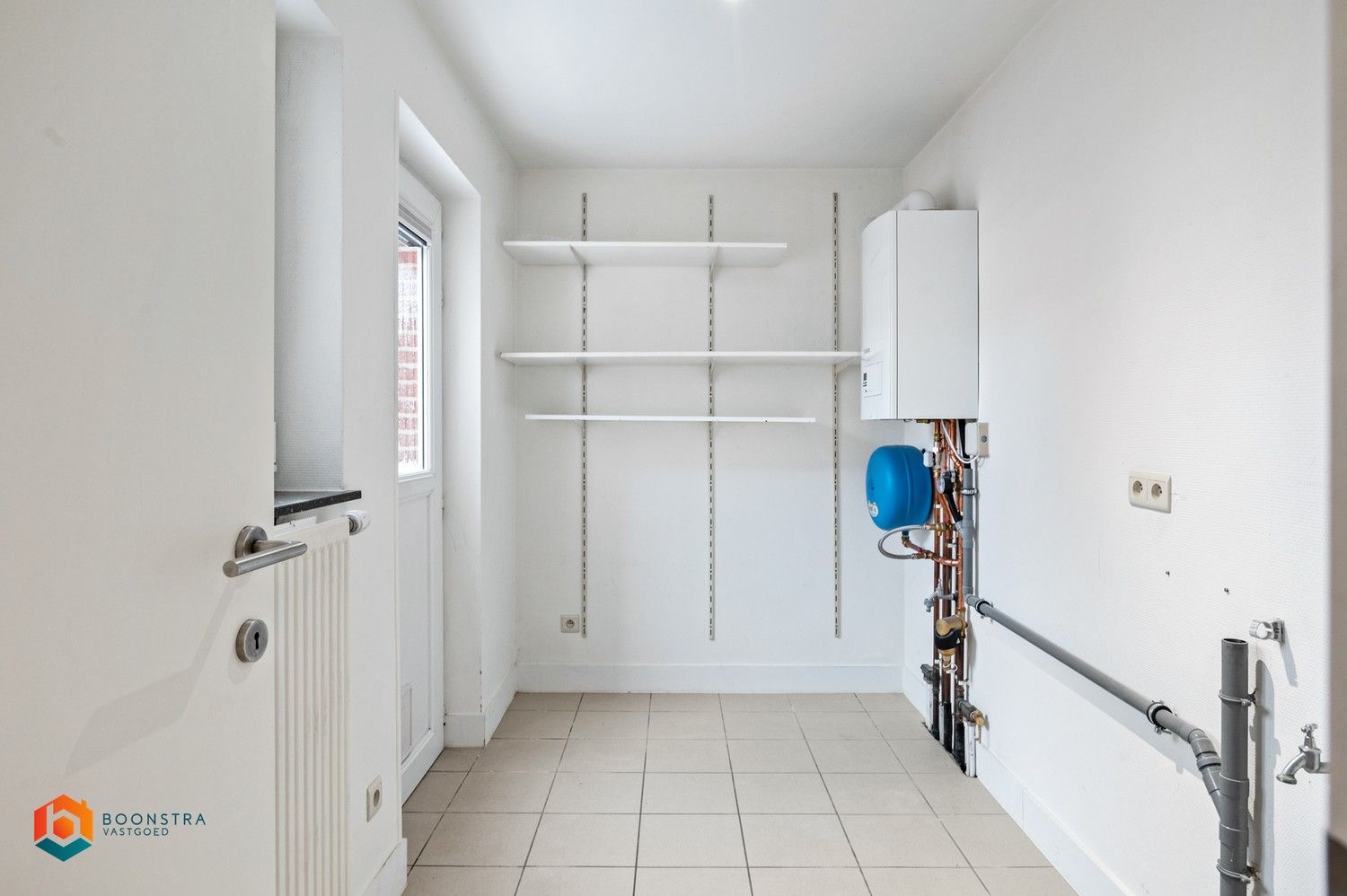 Instapklare rijwoning in centrum Heist foto 6