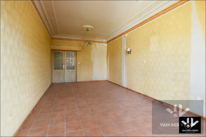 Karaktervolle, te renoveren woning op een perceel van ruim 12 aren. Ideaal gelegen nabij het centrum van Tongeren! foto 6