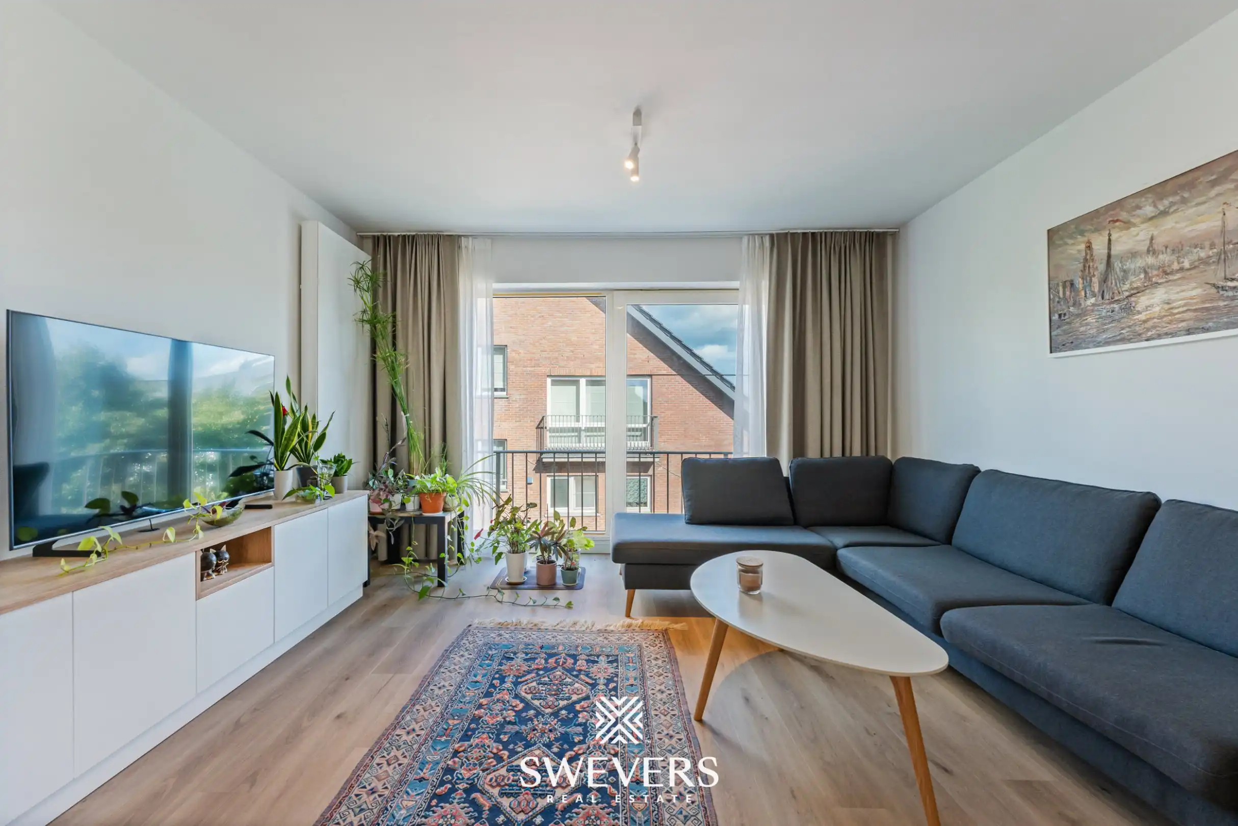 Instapklaar gelijkvloers 3-slaapkamerappartement met autostaanplaats en kelderberging nabij Hasselt-centrum foto 3