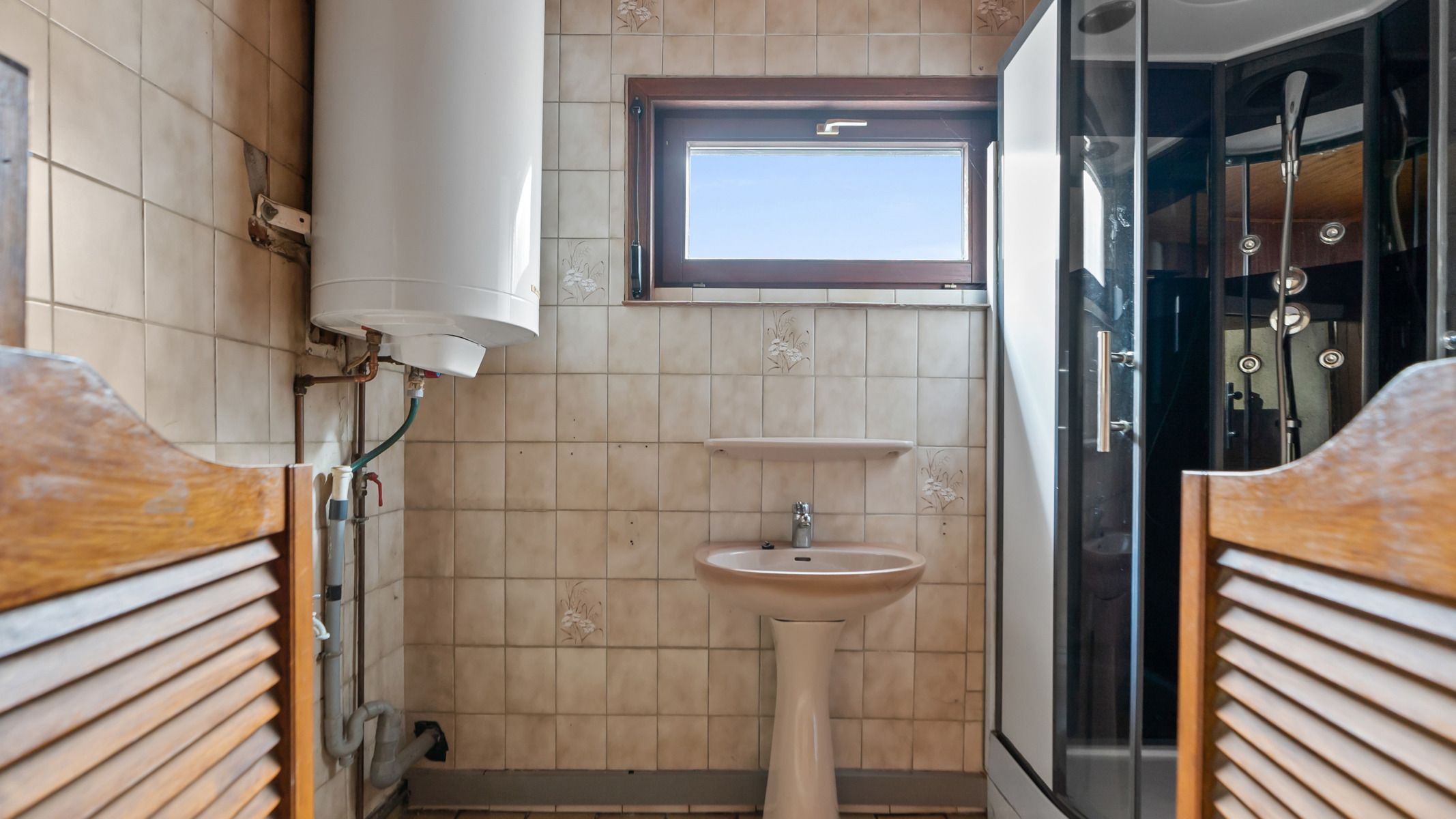 Knusse stadswoning met potentieel in het hart van Herenthout foto 12