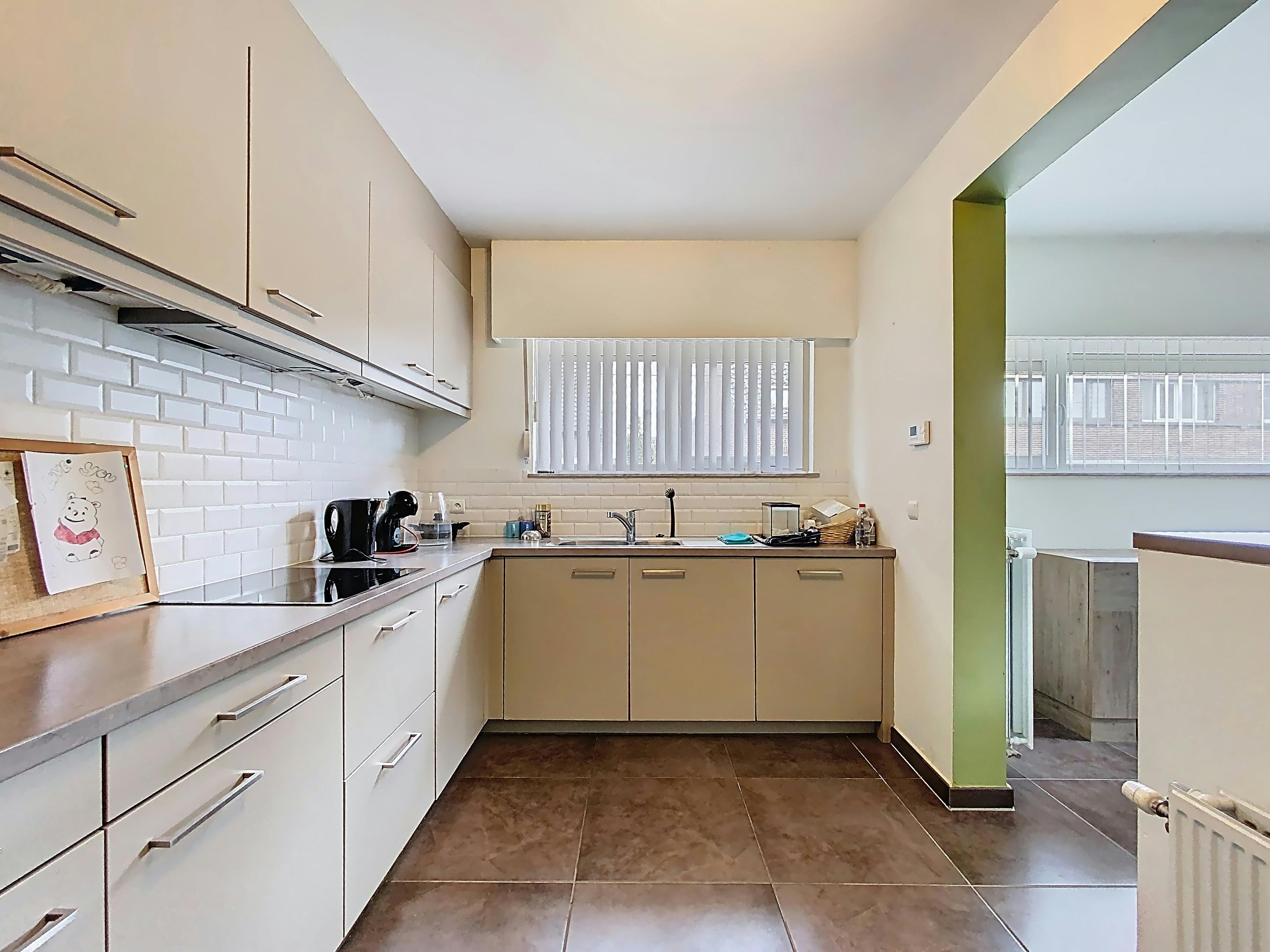 Gezellig gelijkvloers appartement met 2 slaapkamers en tuin foto {{pictureIndex}}