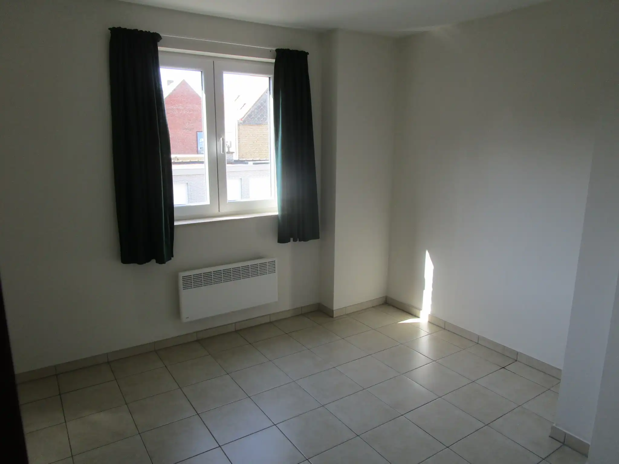 Zeer centraal gelegen appartement met 2 ruime slaapkamers en zonneterras foto 13