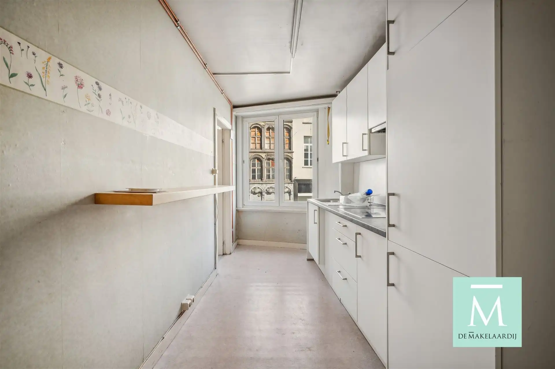 Appartementsgebouw met handelspand op het gelijkvloers foto 19