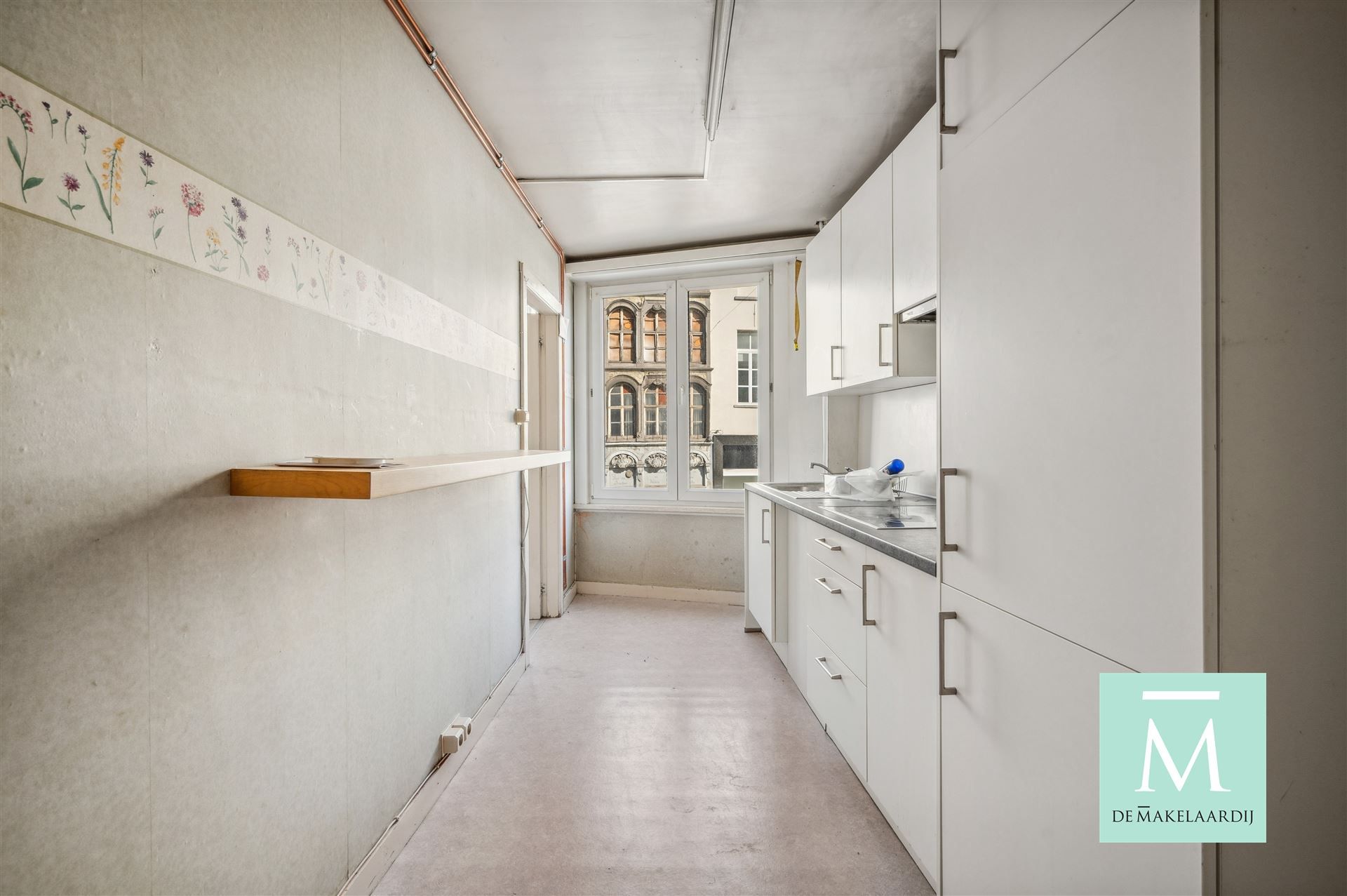 Appartementsgebouw met handelspand op het gelijkvloers foto 19