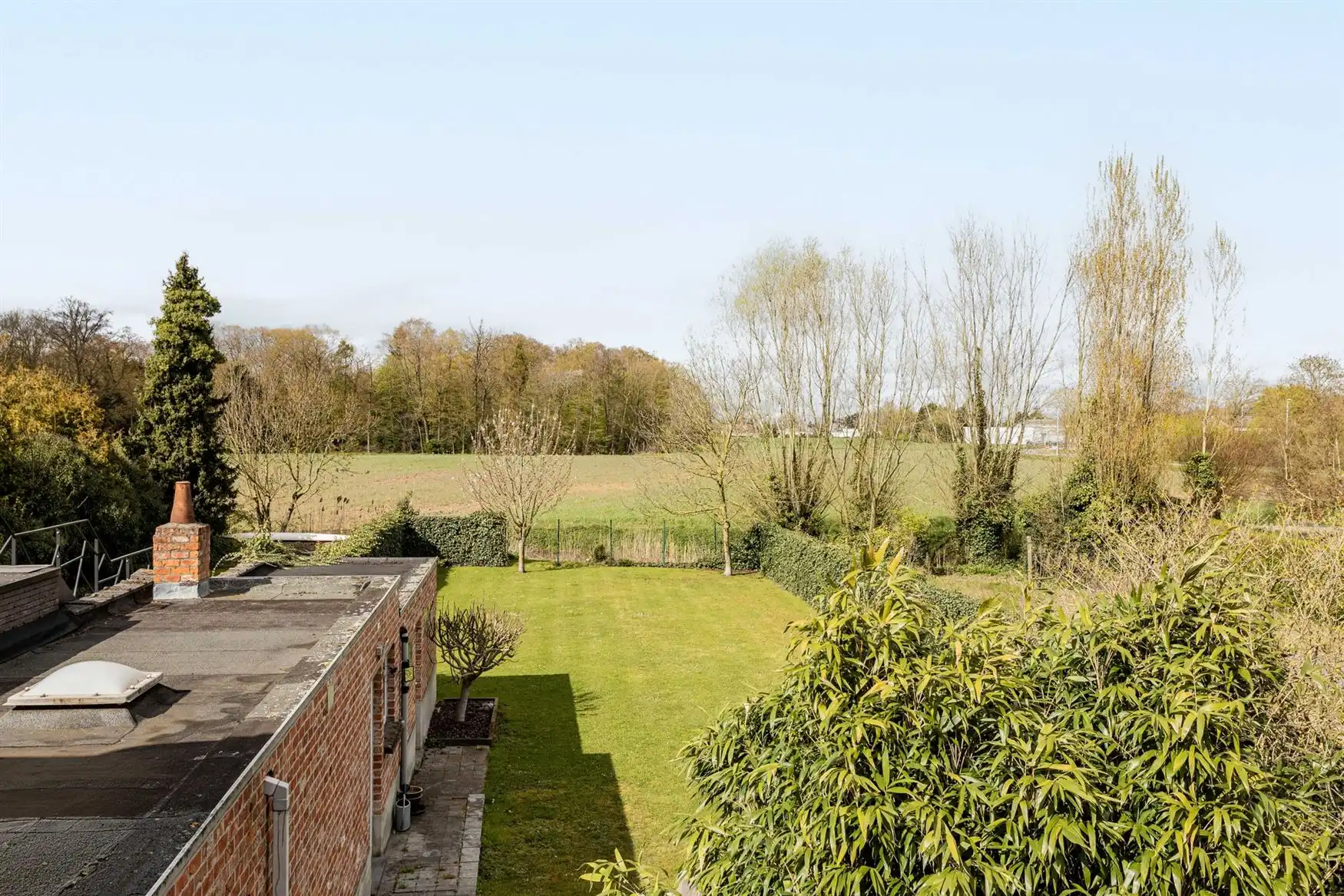 Halfopen woning met zicht op Schipdonkkanaal en velden foto 15