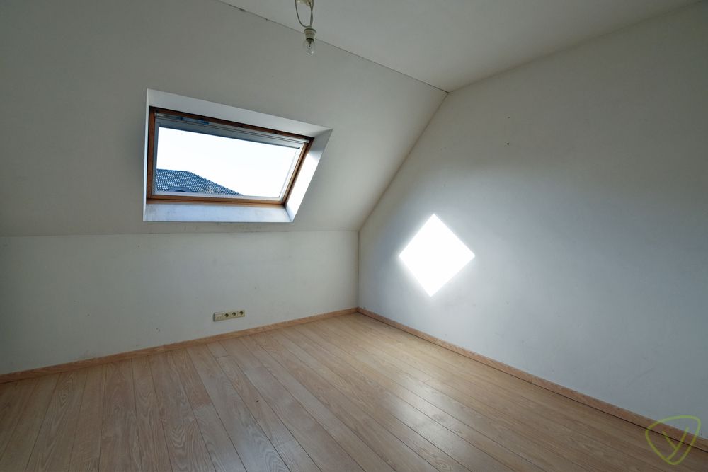 Modern afgewerkte en zeer verzorgde woning met een zonnnige tuin gelegen in een rustige woonwijk! foto 11