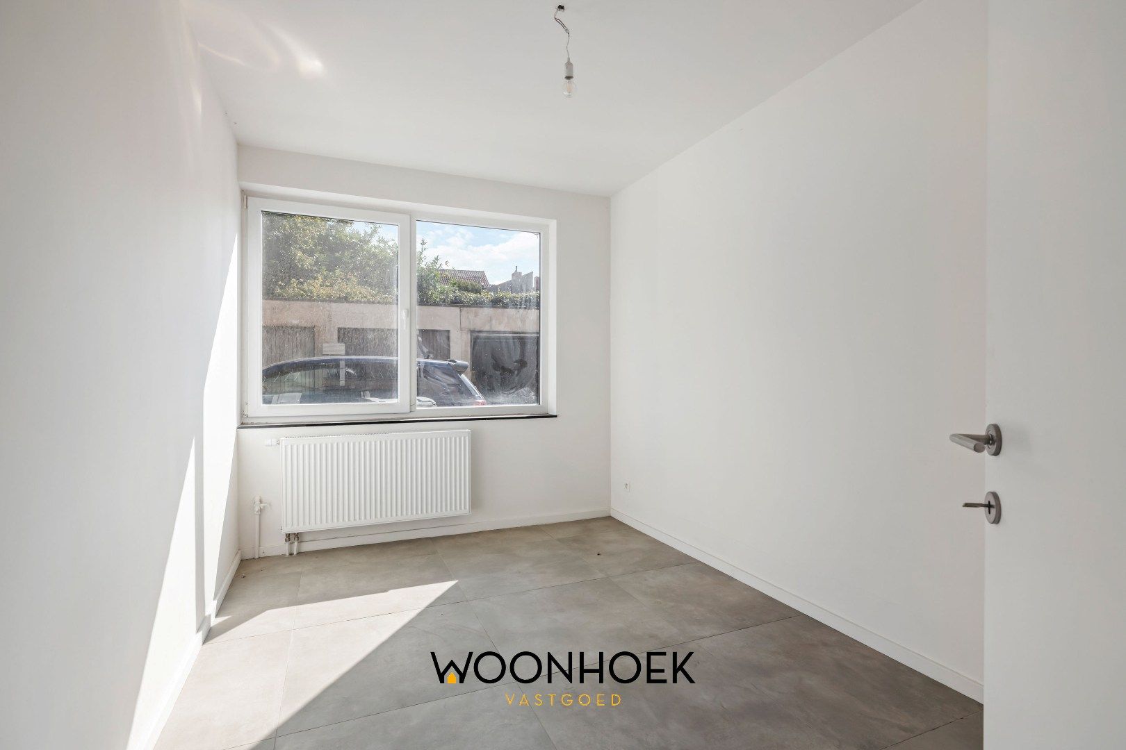 Gerenoveerd appartement op toplocatie te Belsele! foto 11