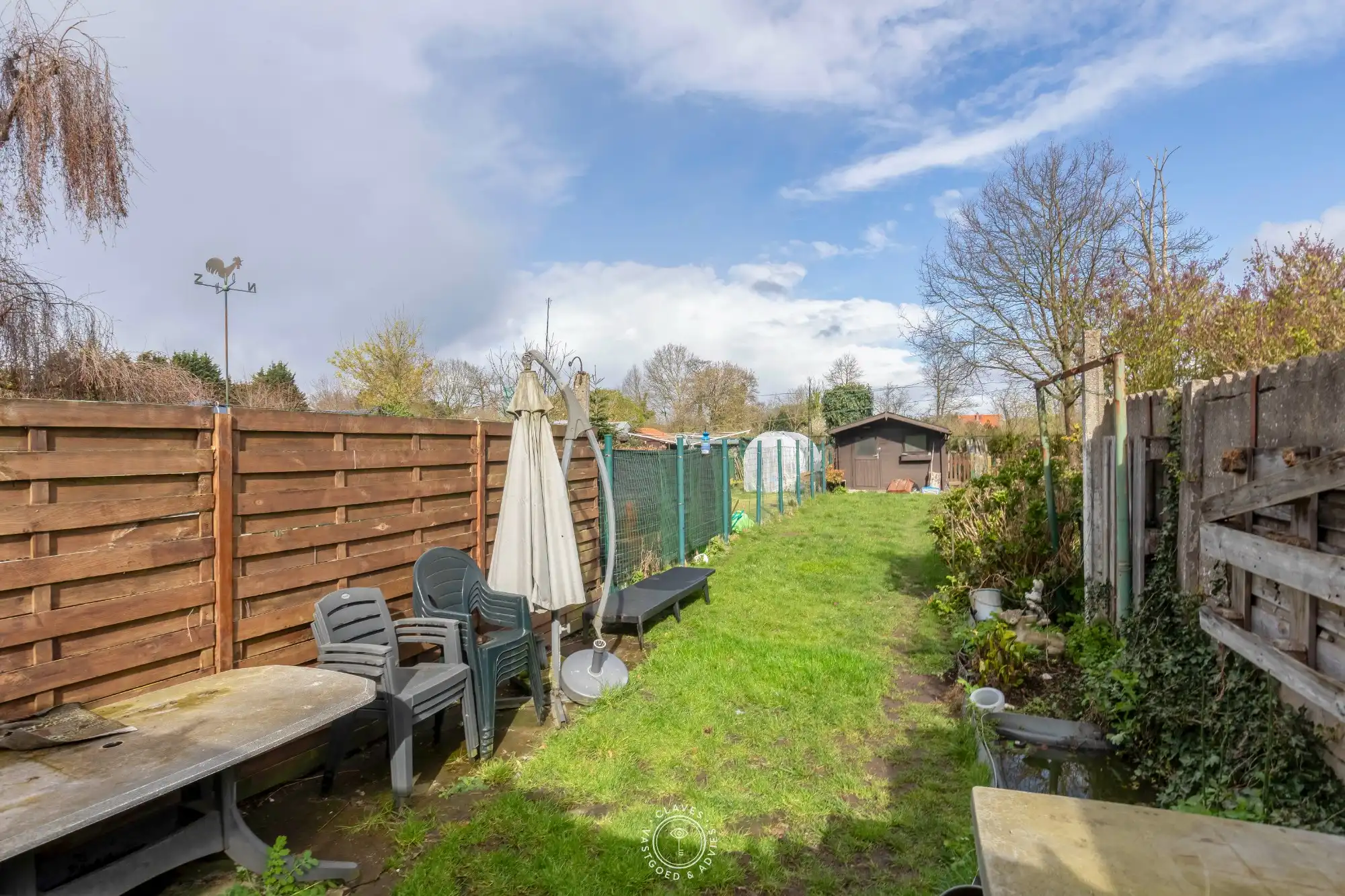 Op te frissen woning met fijne tuin foto 2