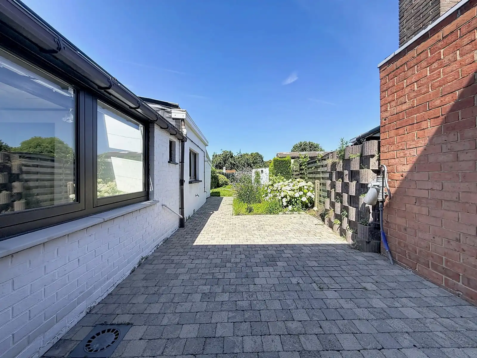 Mooie én instapklare gezinswoning met 3 SLPK én tuin! foto 12