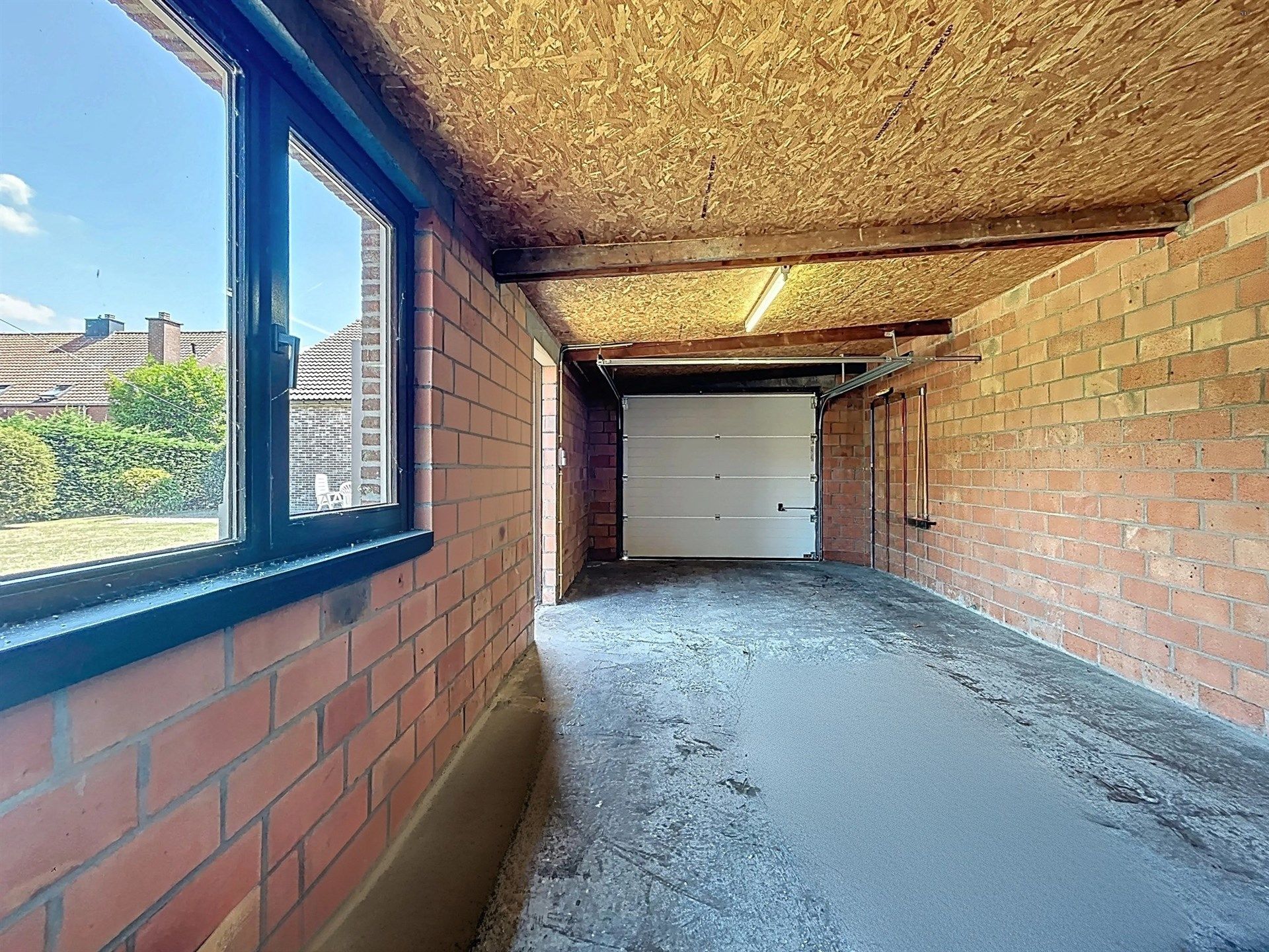 Rustig gelegen en instapklare open bebouwing (type bungalow)  met garage op perceel van 885m²  foto 17