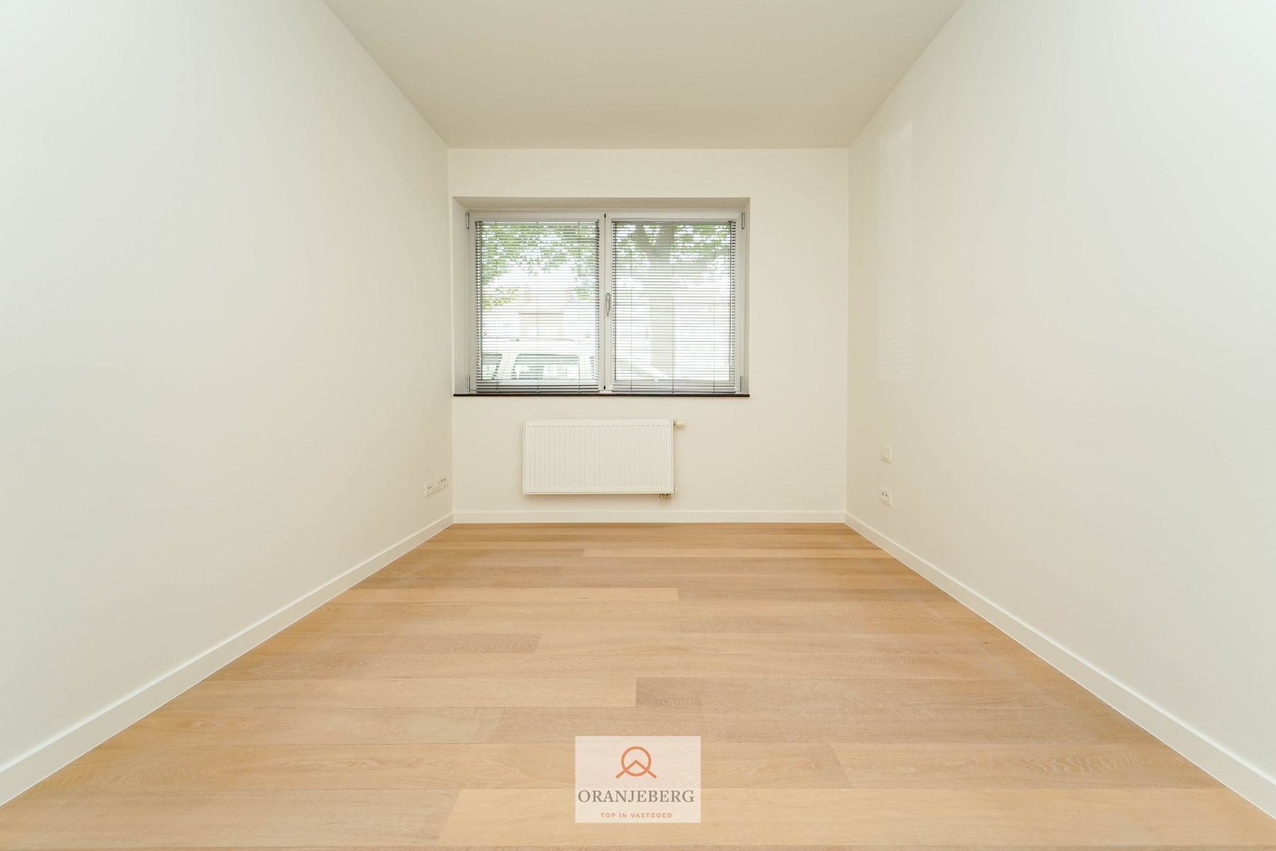 Instapklaar gelijkvloers 2 slpk appartement met tuin foto 7