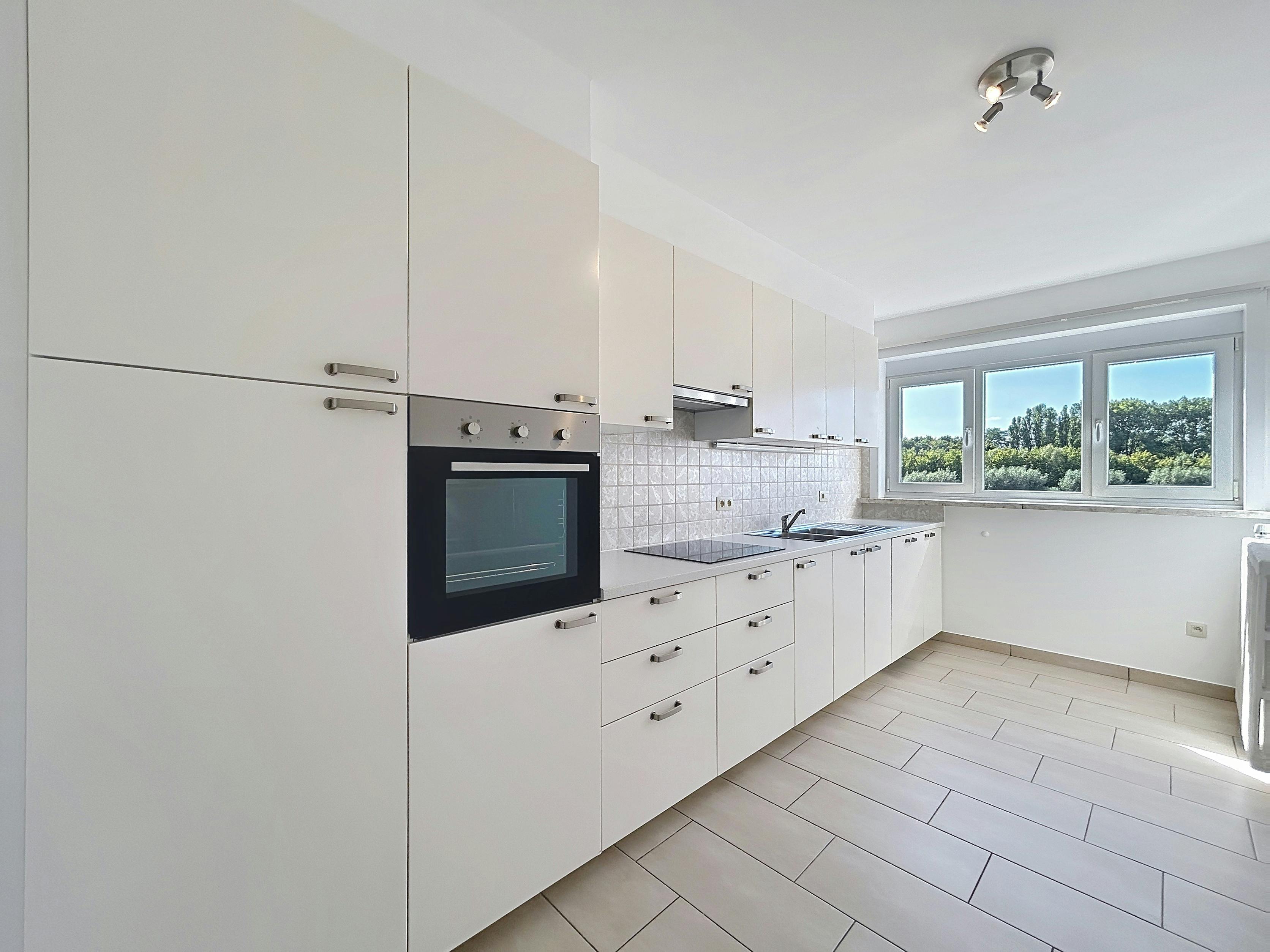 Ruim appartement met 3 kamers te huur in Kortrijk foto 5