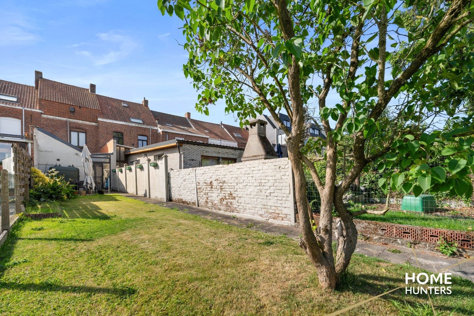 Te renoveren stadswoning met tuin en 3 slaapkamers foto 2