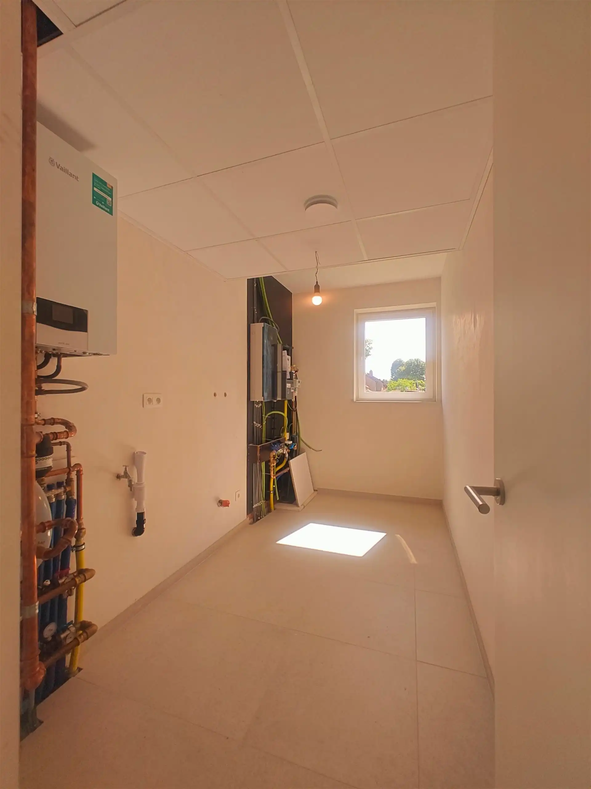 Instapklare nieuwbouwwoning met 3 slaapkamers in een rustige, kindvriendelijke buurt van Maasmechelen. foto 11