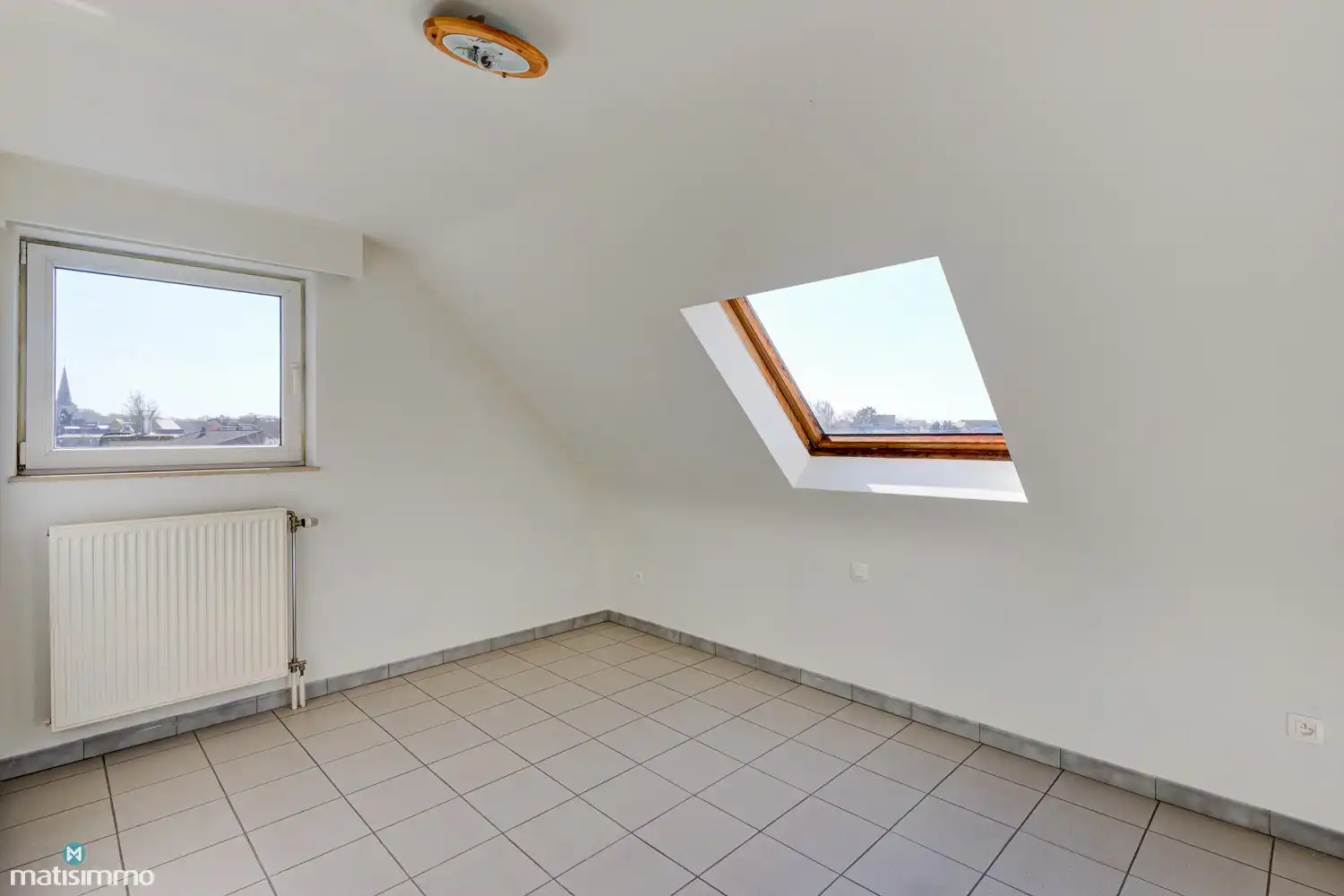 INSTAPKLAAR DUPLEX-APPARTEMENT MET 2 SLAAPKAMERS EN GARAGE NABIJ HET CENTRUM VAN BILZEN foto 12