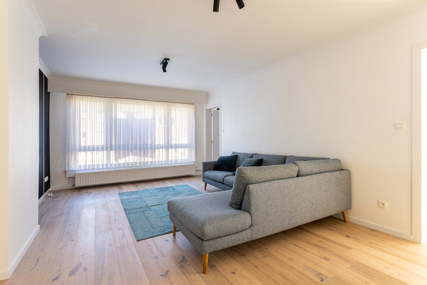 Charmant gelijkvloers appartement met 2 slaapkamers! foto 2