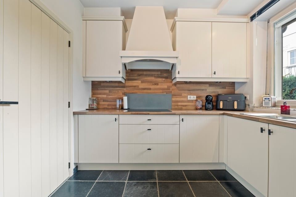 GEZELLIGE OPEN BEBOUWING MET LANDELIJKE CHARME OP EEN MOOI PERCEEL foto 12