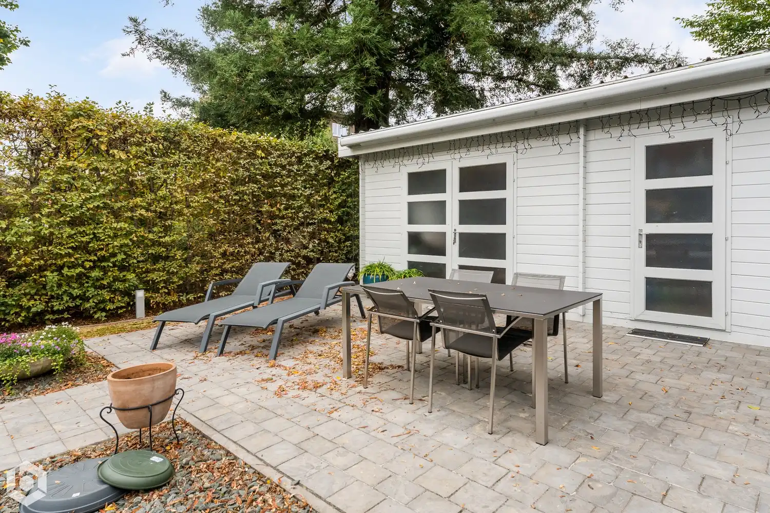 Exclusief gelijkvloers appartement met 2slpkrs, prachtige tuin en zwembad foto 31