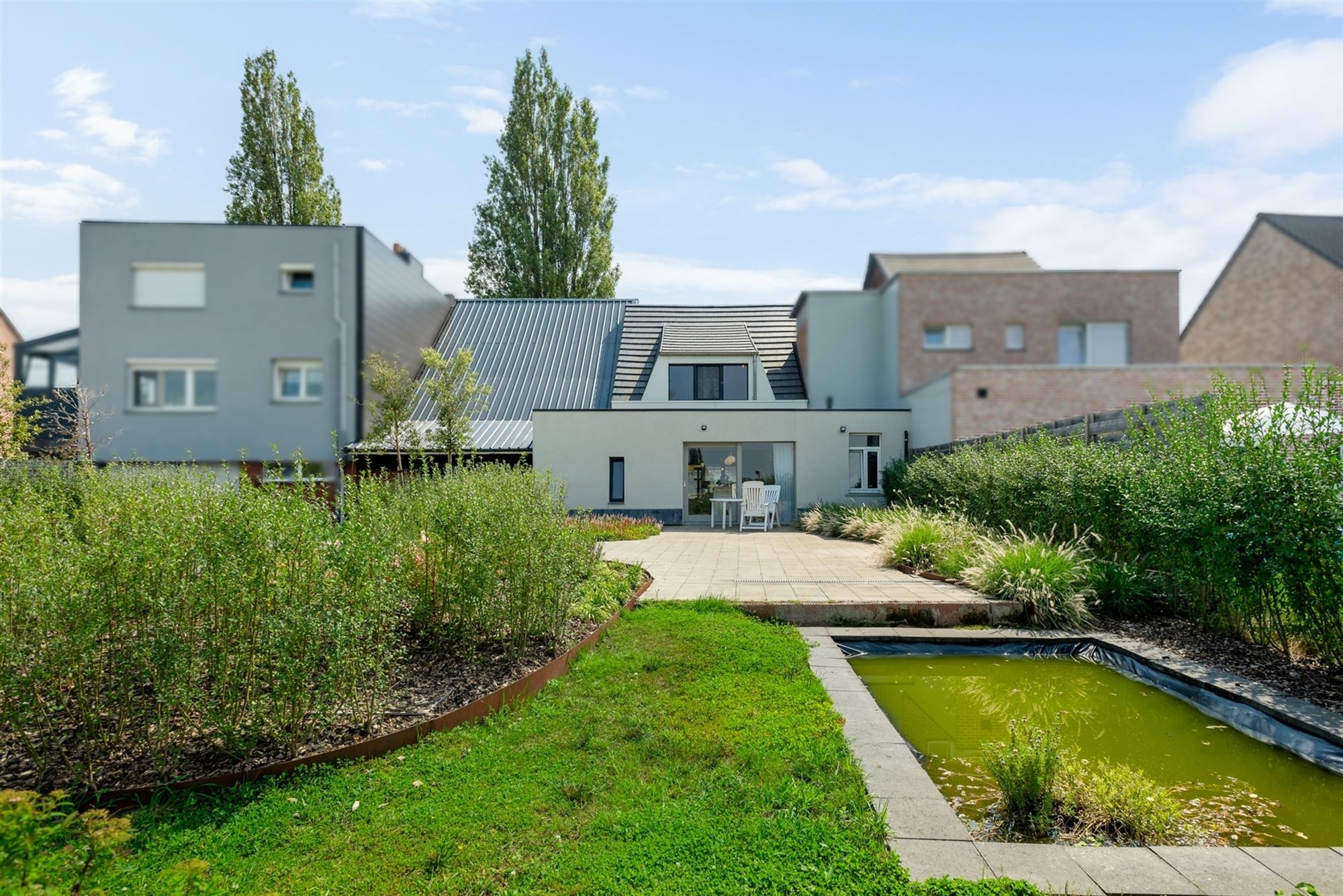 Perfect instapklare woning met uitzonderlijk uitzicht op achterliggende velden foto 1