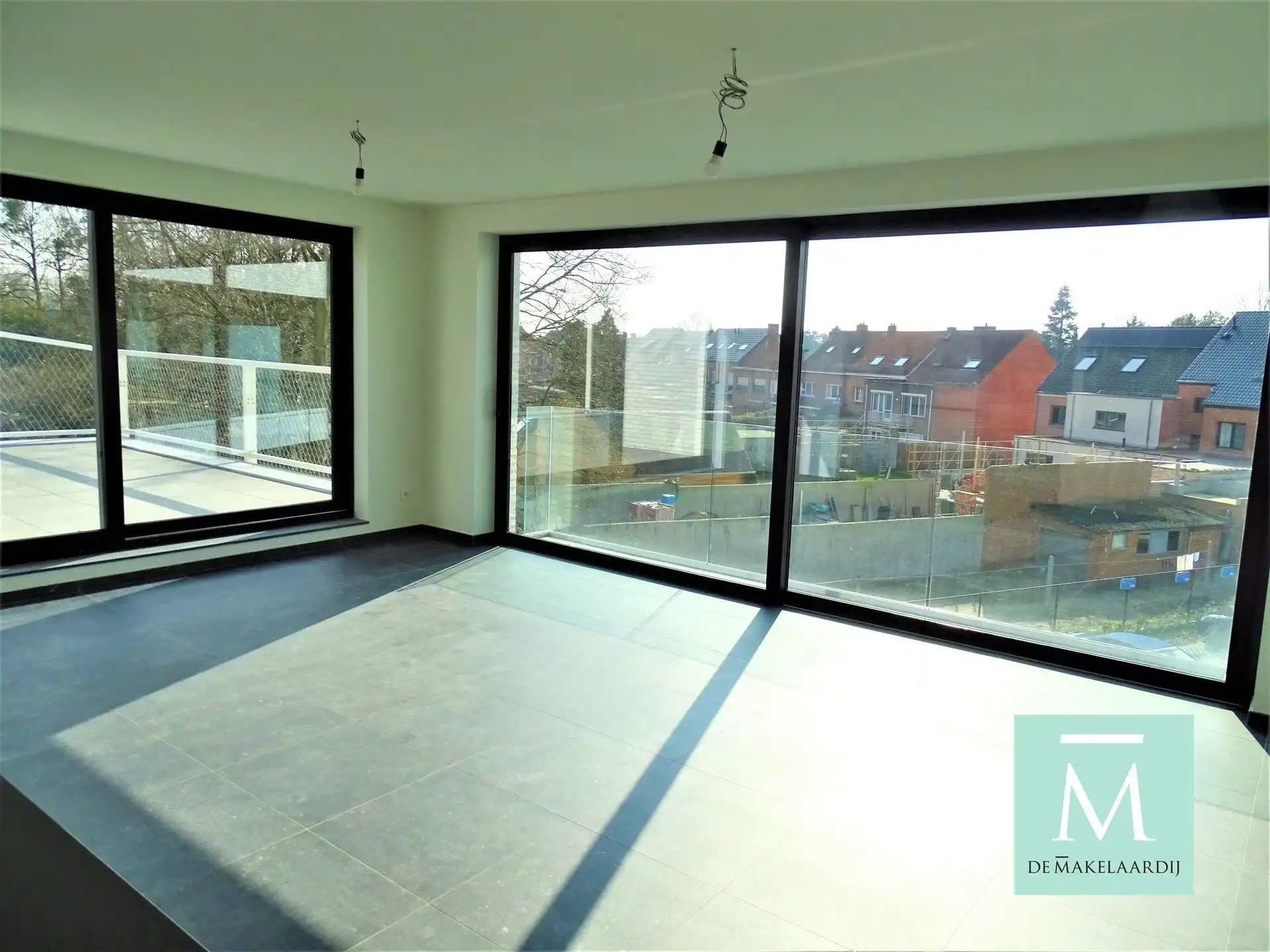 Aangenaam appartement, 2 slaapkamers, ruim terras (75m²), kelder en autostaanplaats foto 2