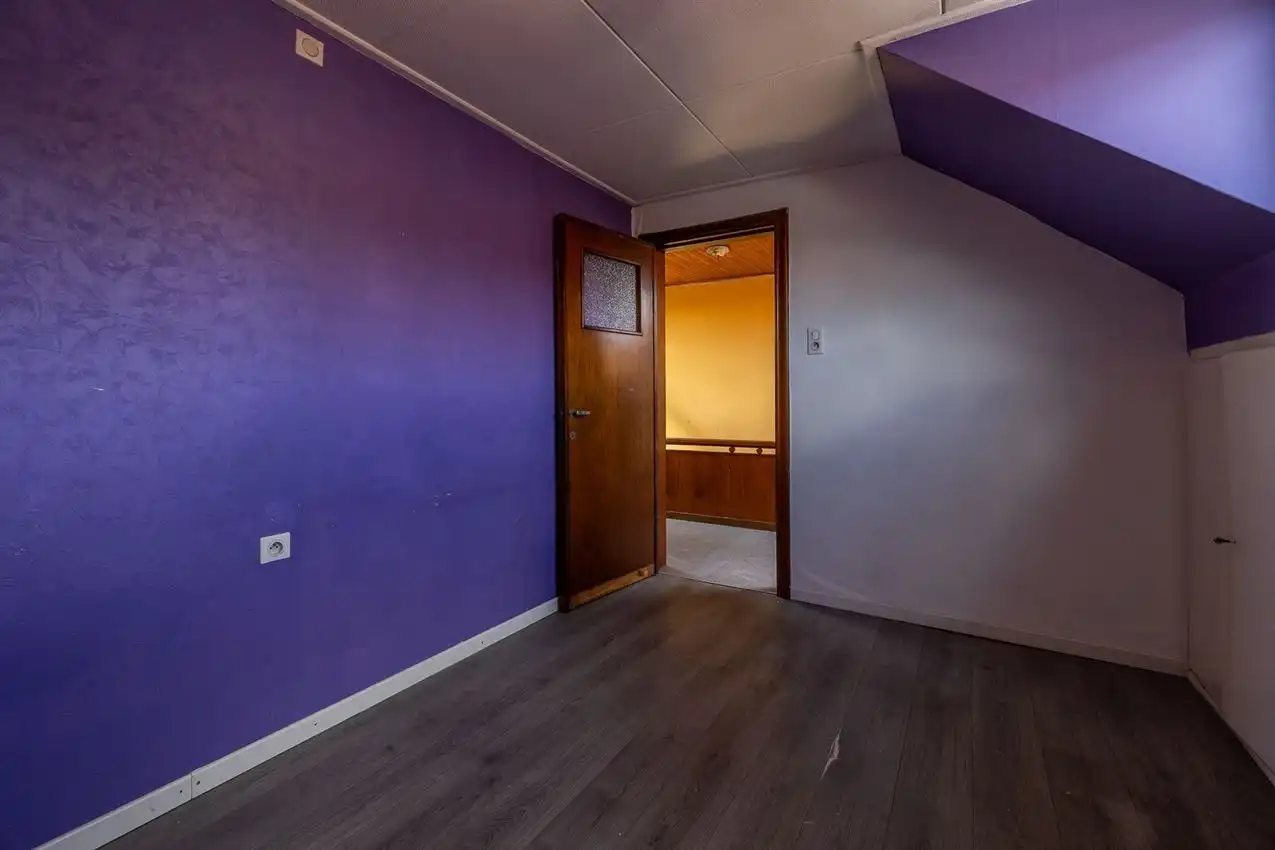 Ruime woning met zuidgerichte tuin en garage in rustige straat nabij centrum. EPC C en 5+ slaapkamers. foto 28