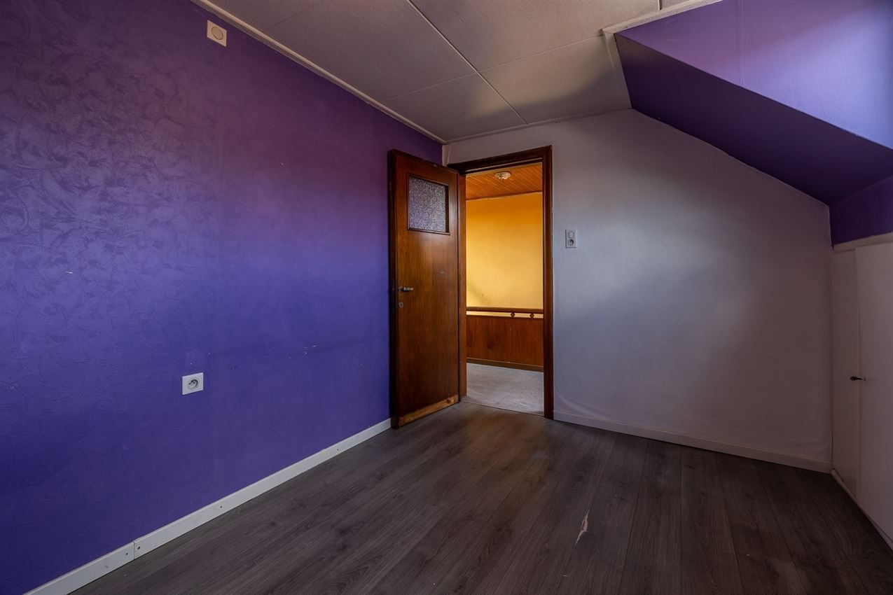 Ruime woning met zuidgerichte tuin en garage in rustige straat nabij centrum. EPC C en 5+ slaapkamers. foto 28