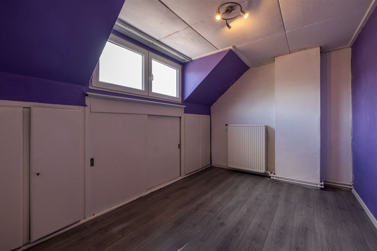Ruime woning met zuidgerichte tuin en garage in rustige straat nabij centrum. EPC C en 5+ slaapkamers. foto 28