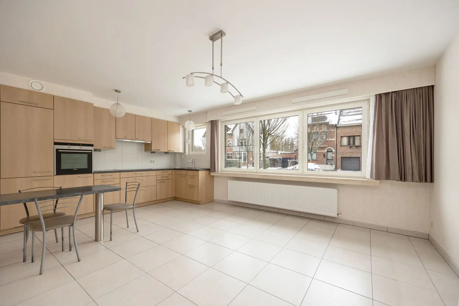 Gelijkvloersappartement met grote tuin & garage foto 4