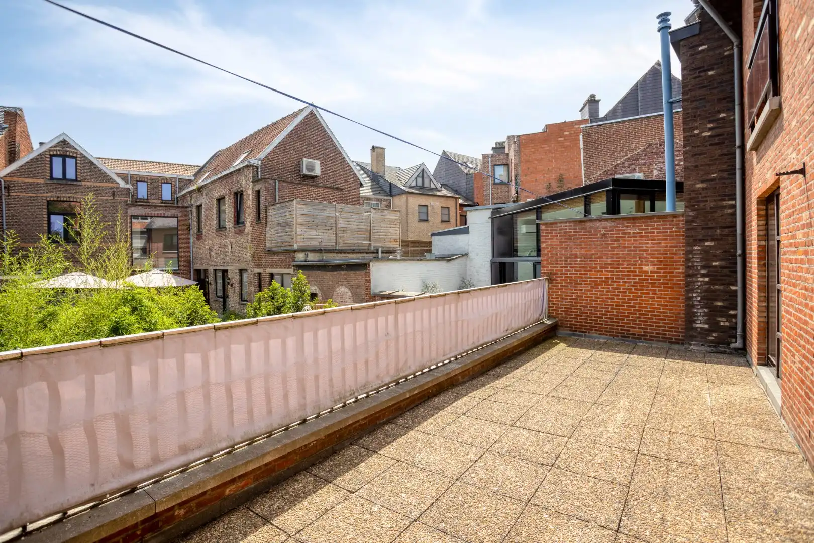 Gebouw met 2 appartementen, grote garage en gezellig terras - centrum Tongeren foto 3