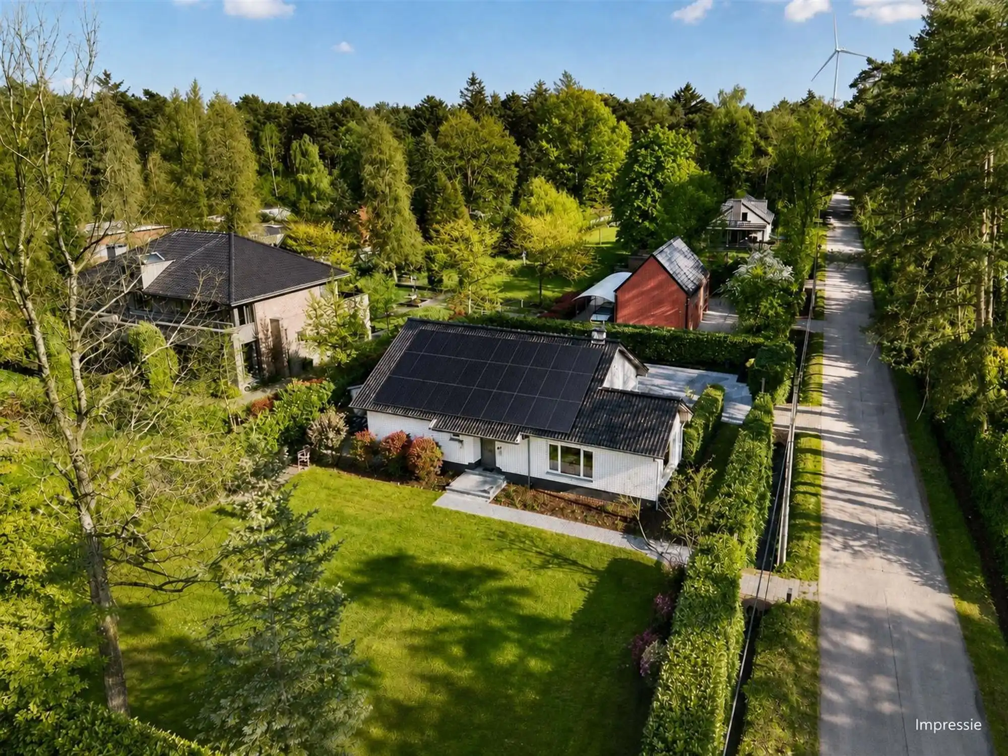 Ruime villa met zuidgerichte tuin en maximale privacy foto {{pictureIndex}}