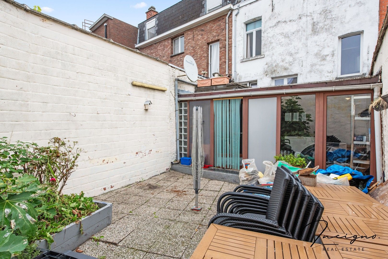 Op te frissen rijwoning met 4 slaapkamers & stadskoer foto 18