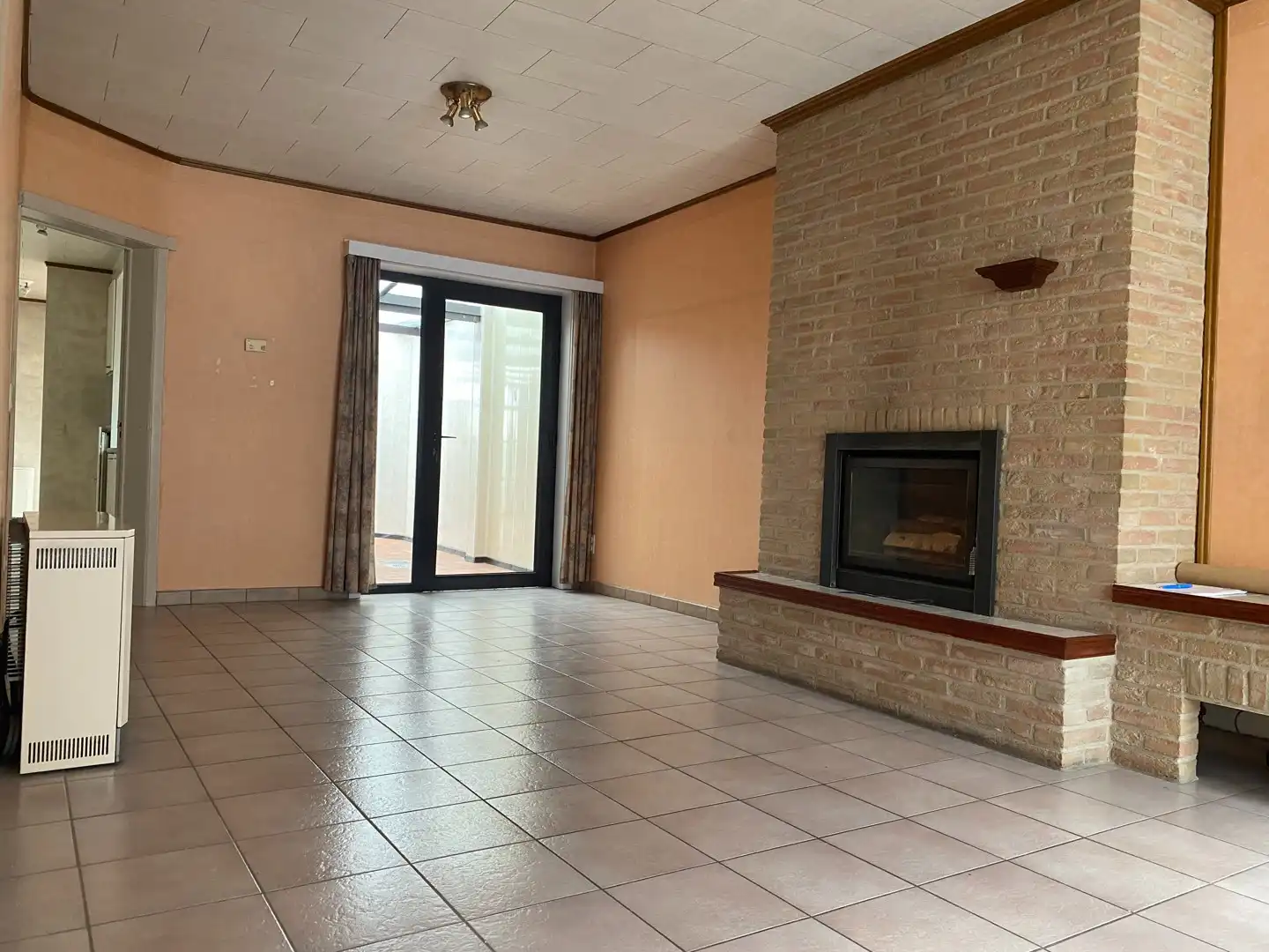 Charmante rijwoning met 2 slpk en koer foto 3