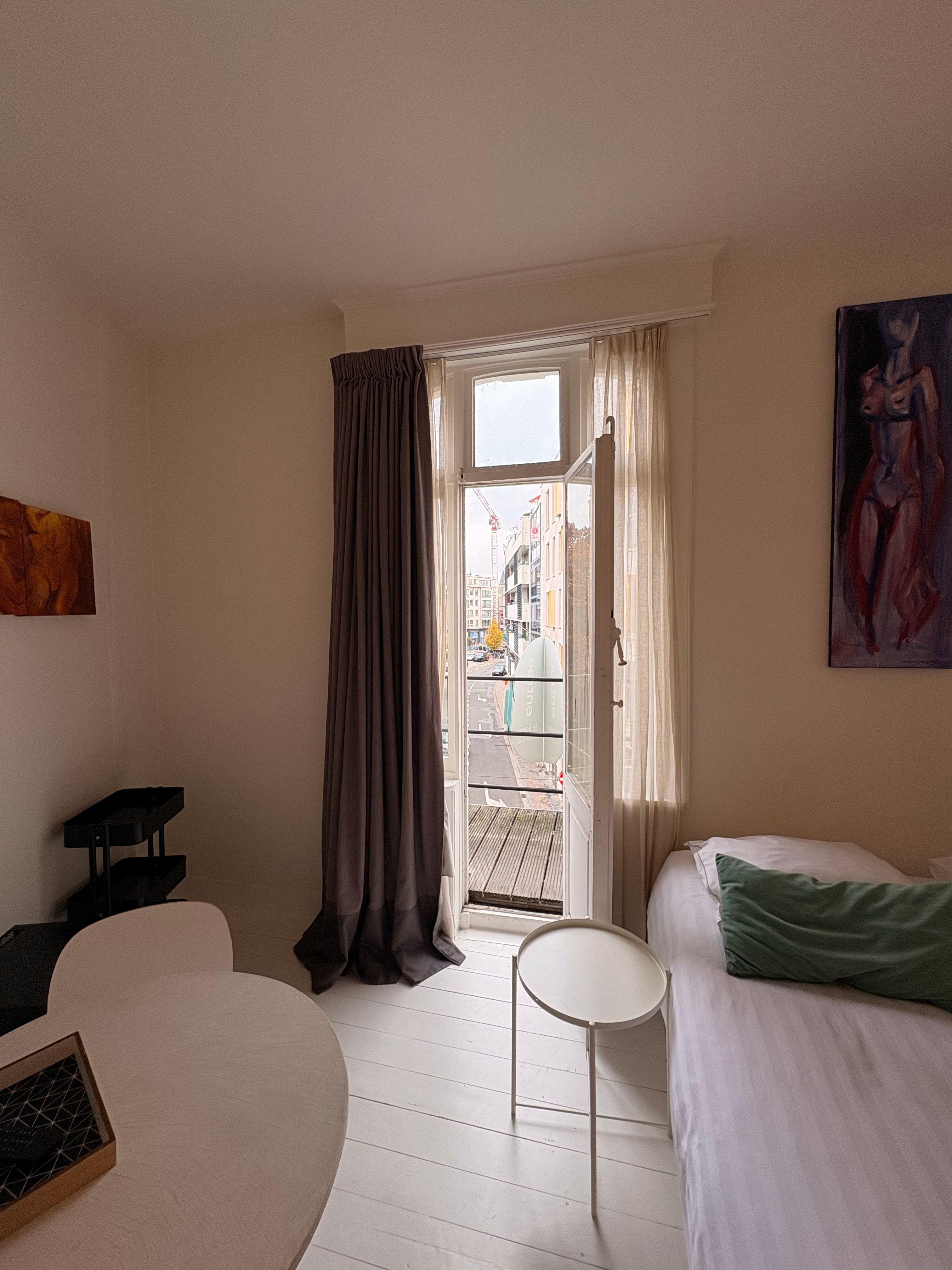 Handelspand met drie studio’s te koop op topligging in Gent foto 18