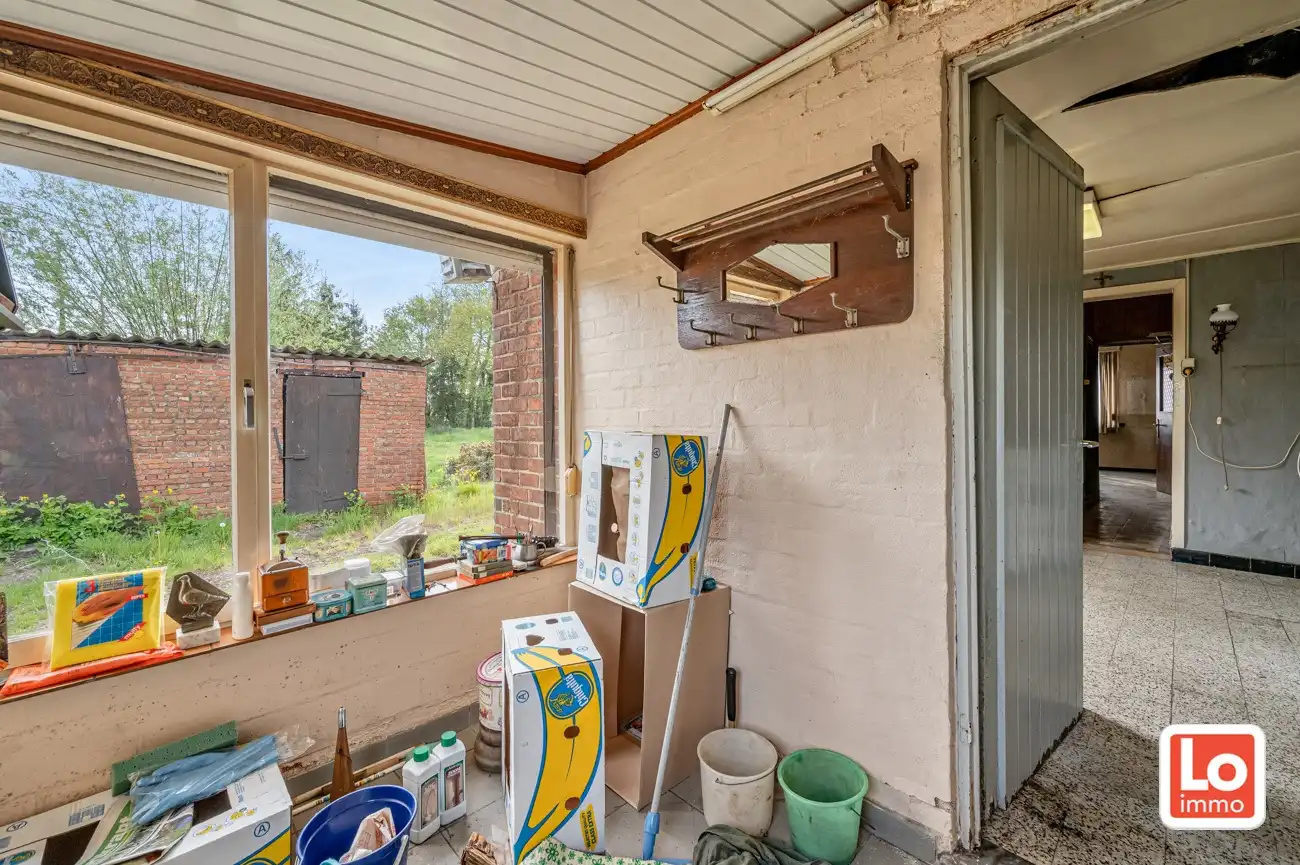 VERKOCHT! Landelijk gelegen halfopen afbraakwoning op groot perceel grond met open zicht in Zeveneken! foto 15