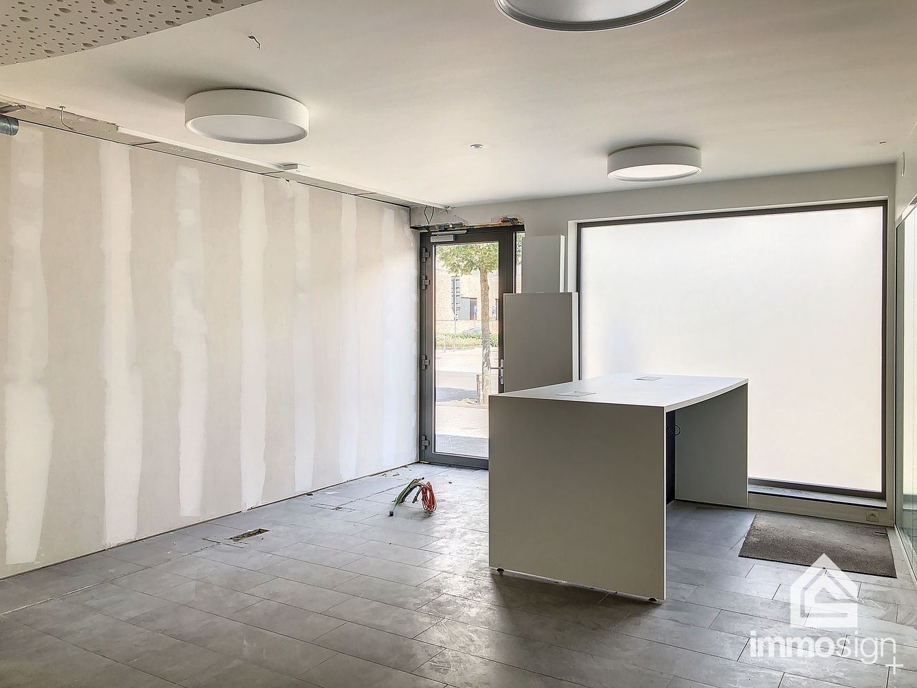 Ruime kantoorruimte met aanpalend bankcontact in het centrum van Kaulille! foto 9