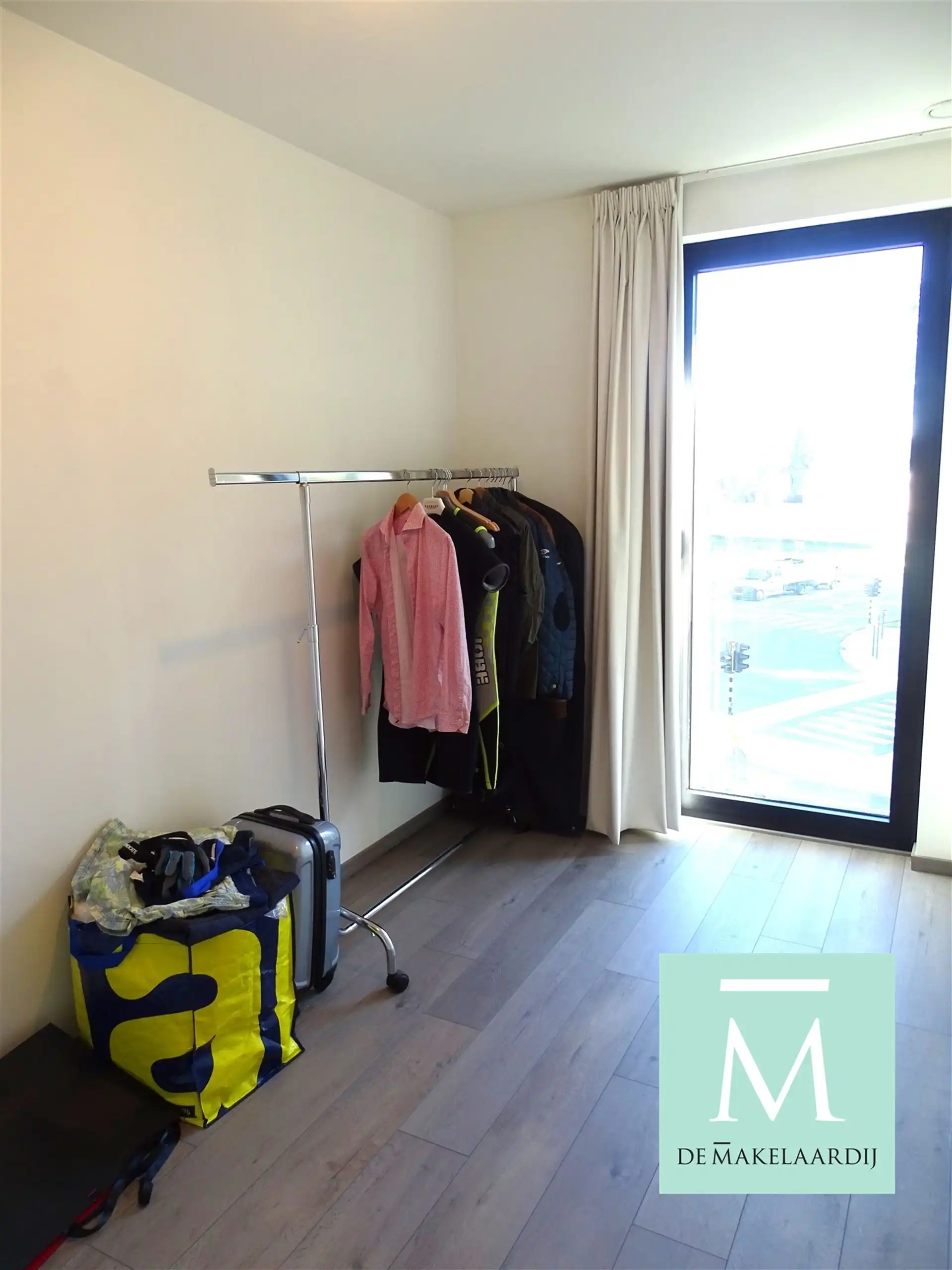 Aangenaam appartement, 2 slaapkamers, ruim terras (75m²), kelder en autostaanplaats foto 8